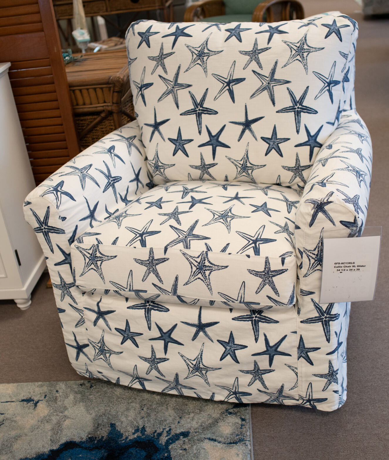 Callie XL Swivel Glide Chair in Starfish Vista
